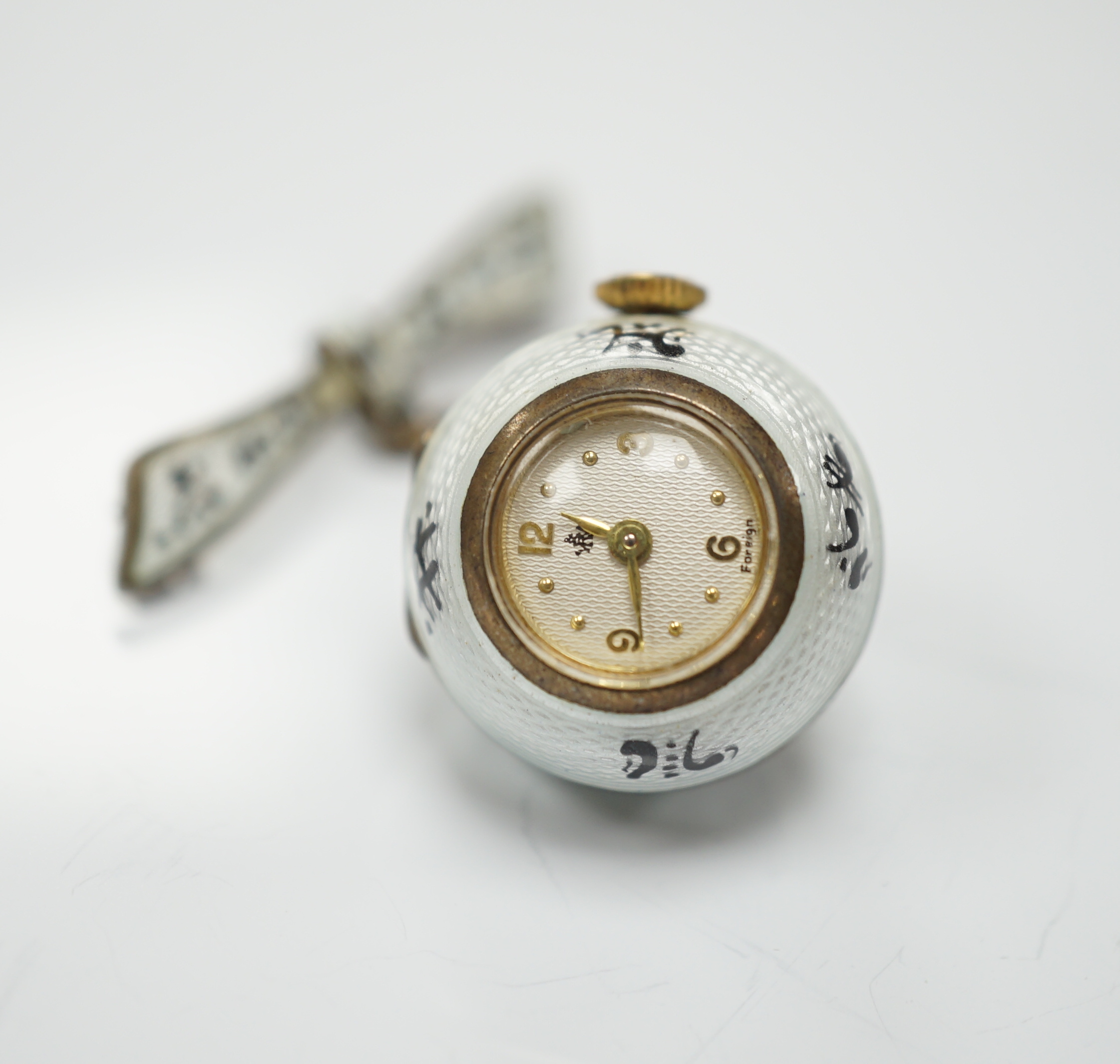 An early to mid 20th century silver and two colour enamel globe pendant watch, on suspension chain with brooch attachment, diameter 20mm.